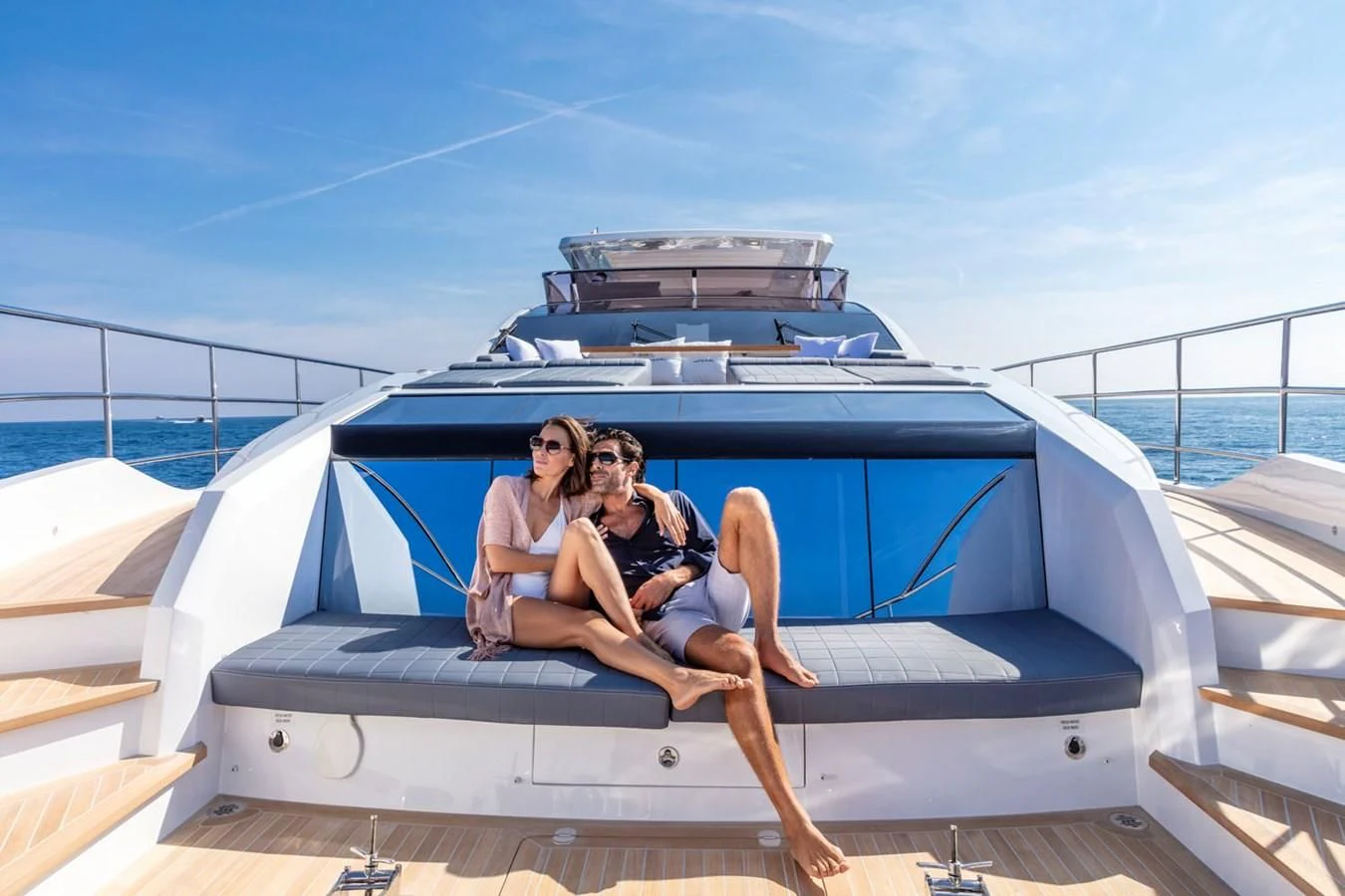 a couple sitting on a boat aboard PEARL Yacht for Sale