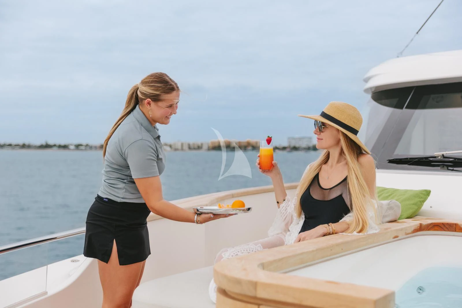 a couple of women on a boat aboard PEARL Yacht for Sale