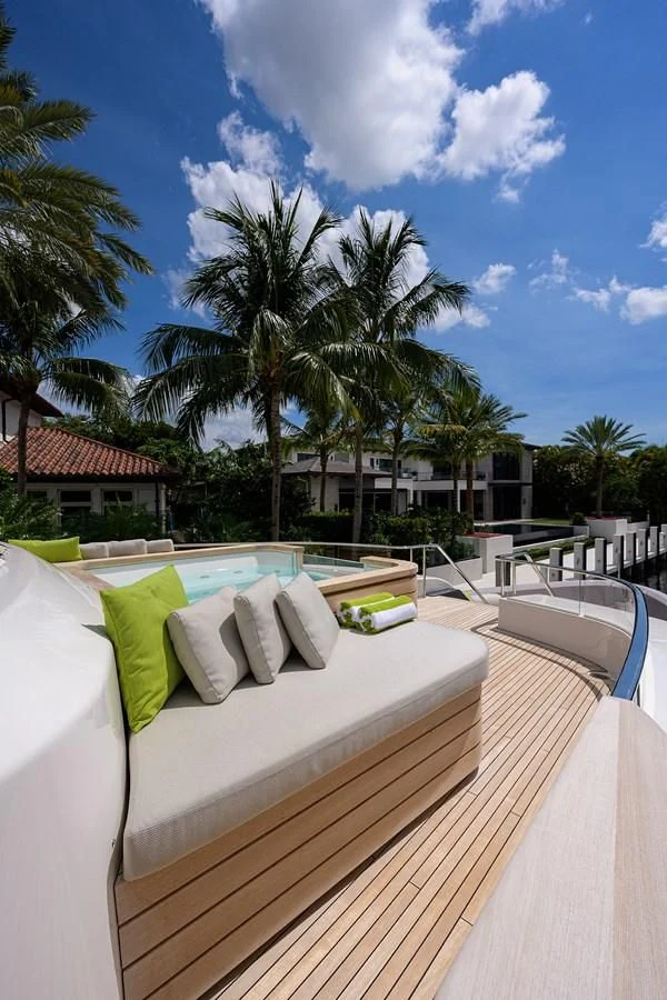 a bed with pillows on it aboard PEARL Yacht for Sale