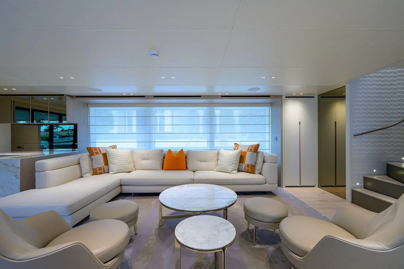 a living room with a large window aboard PEARL Yacht for Sale