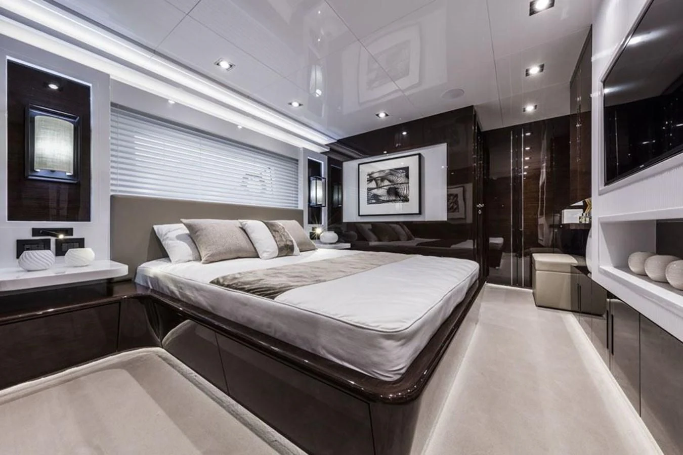 a large bedroom with a large bed aboard PEARL Yacht for Sale