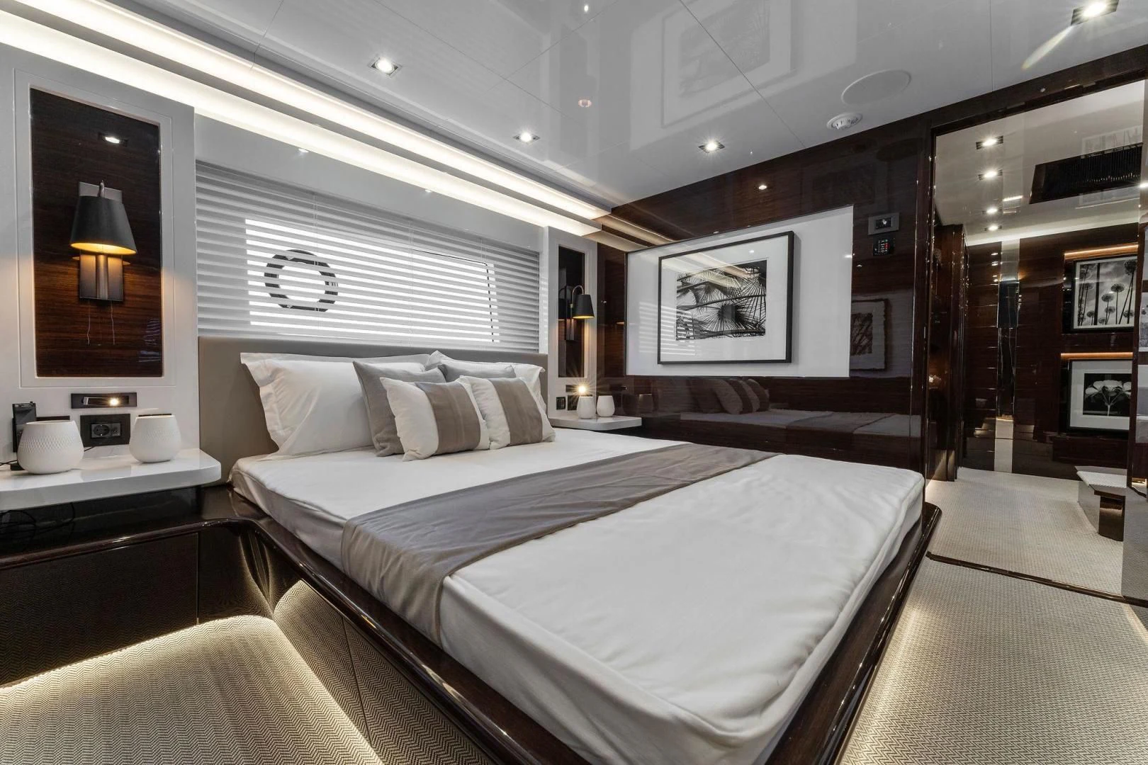 a large bedroom with a large bed aboard PEARL Yacht for Sale