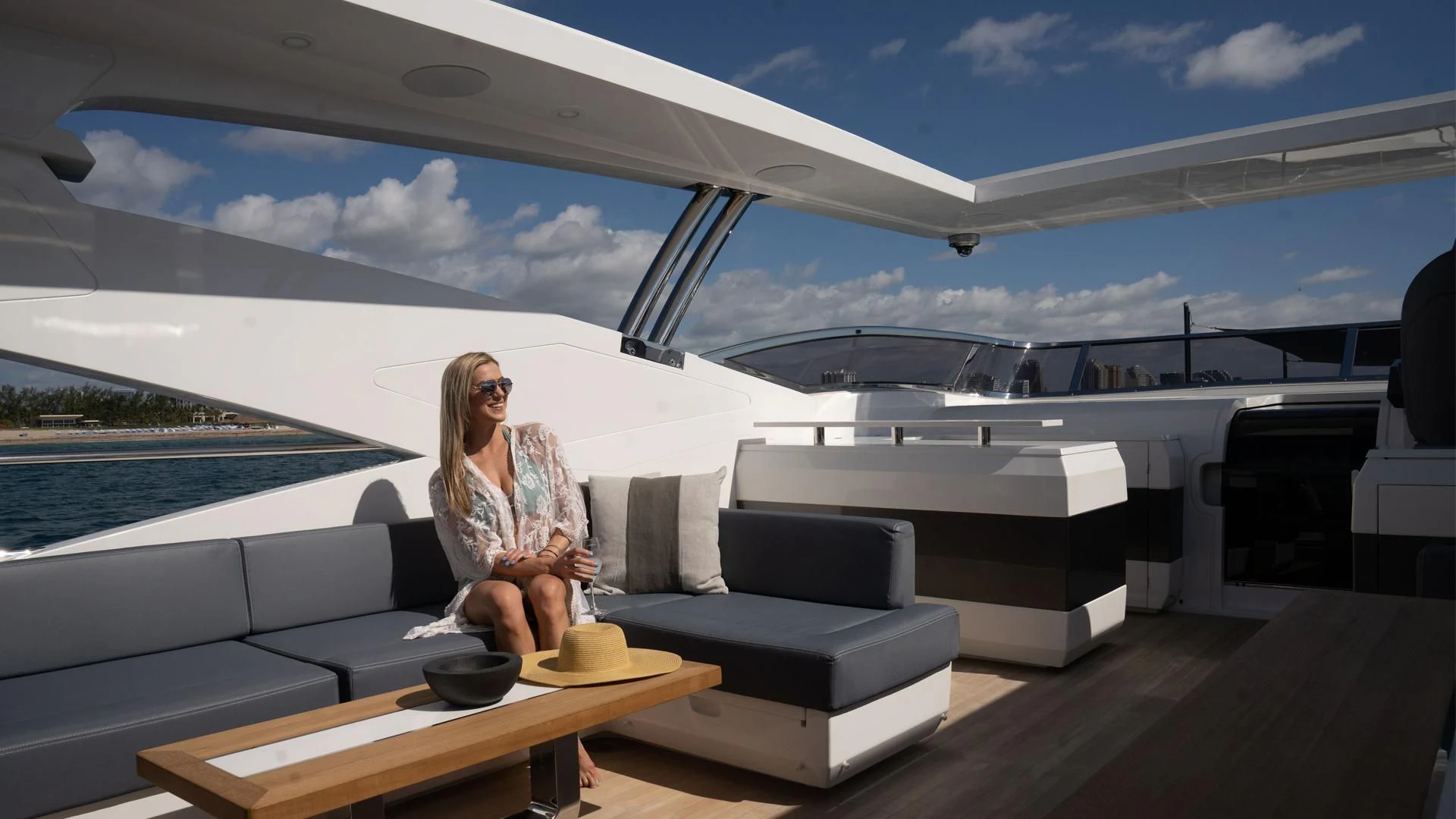 a person sitting on a yacht aboard PEARL Yacht for Sale