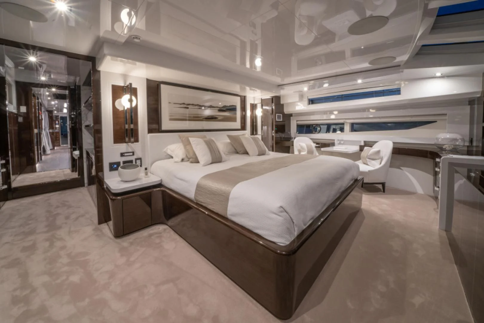 a room with a bed and a mirror aboard PEARL Yacht for Sale
