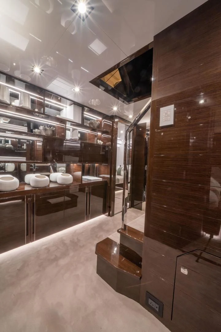 a large kitchen with a large glass wall aboard PEARL Yacht for Sale