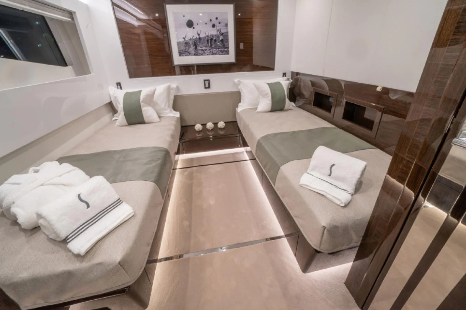 a room with a couch and a table aboard PEARL Yacht for Sale