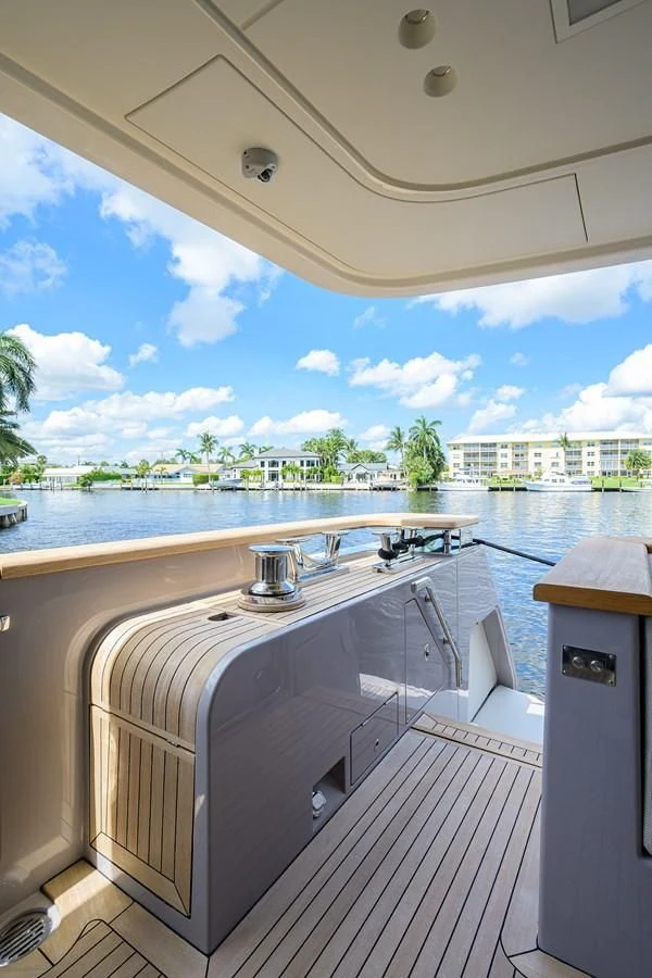 a deck with a sink and a view of a city aboard PEARL Yacht for Sale