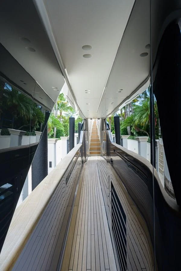 a long wooden walkway aboard PEARL Yacht for Sale