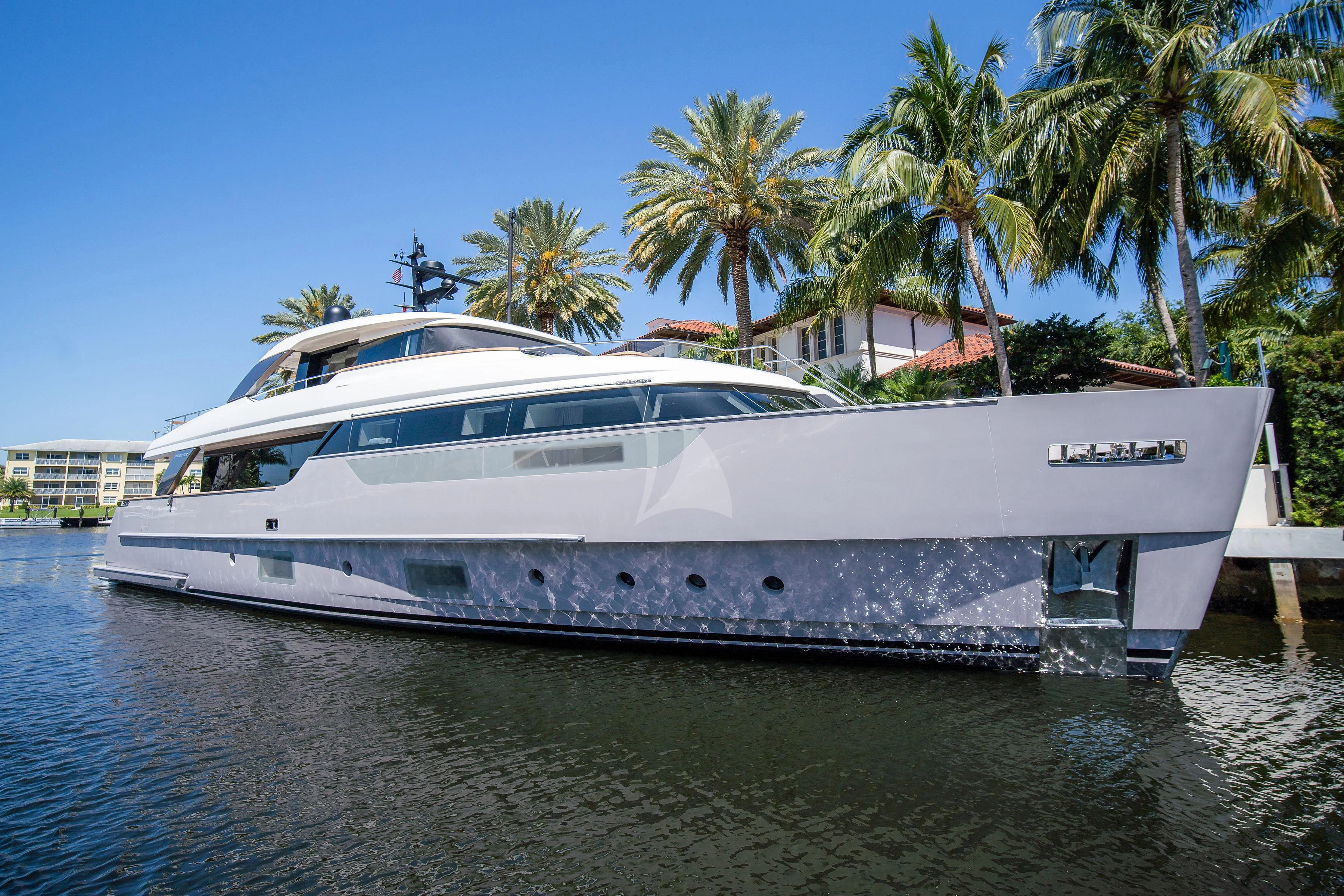 a white yacht on the water aboard PEARL Yacht for Sale