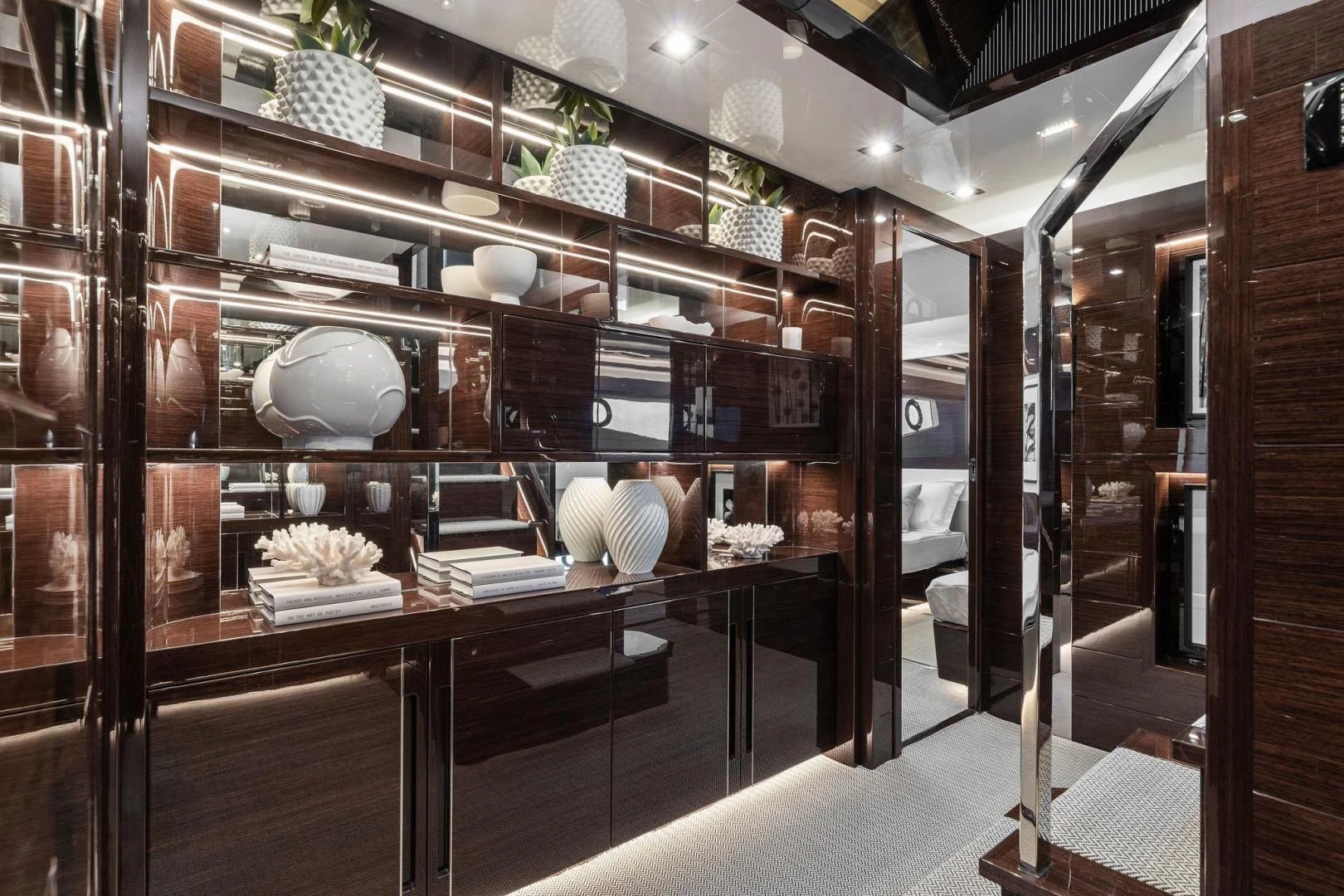 a kitchen with a large glass wall aboard PEARL Yacht for Sale