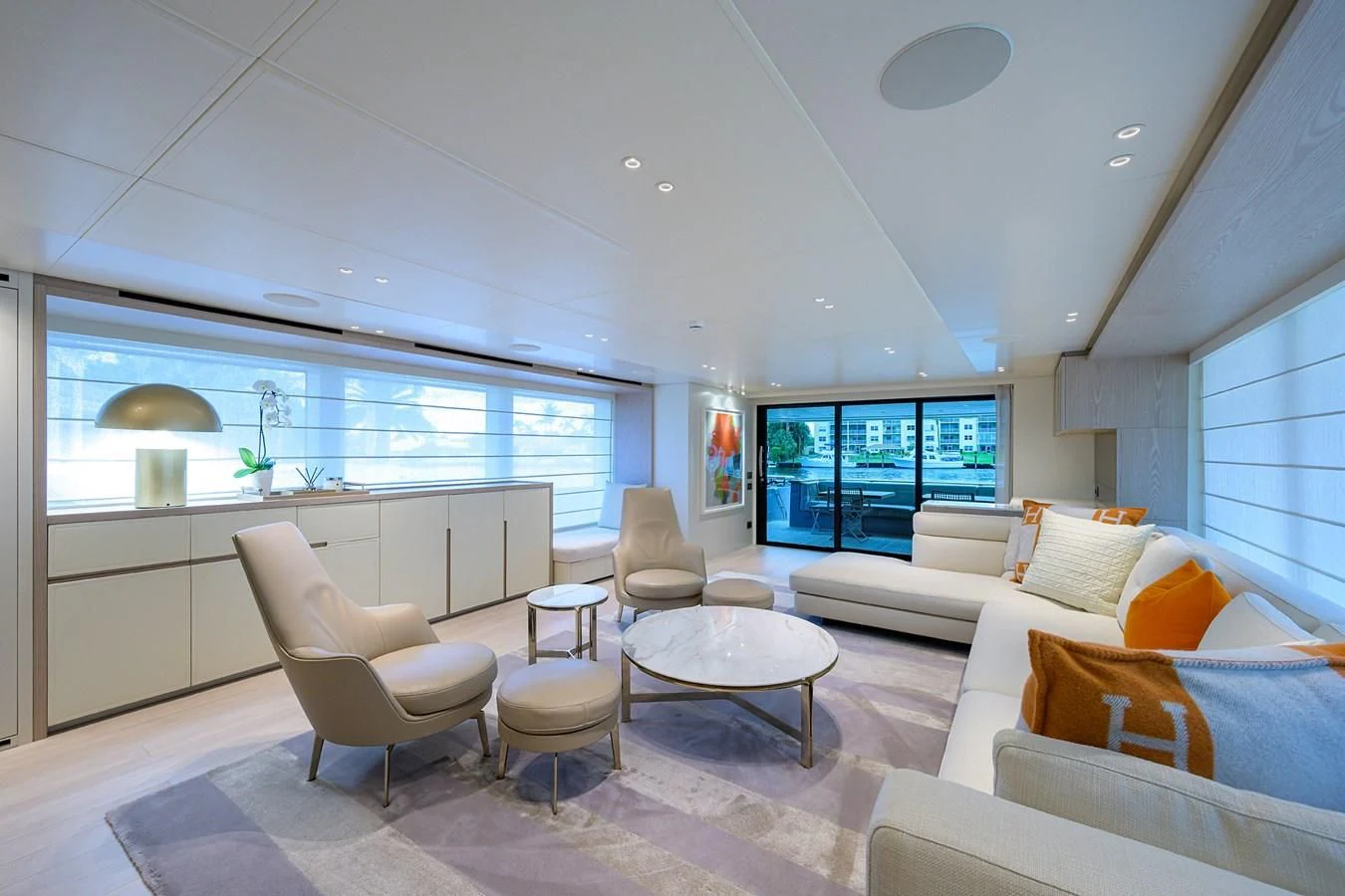 a living room with a large window aboard PEARL Yacht for Sale