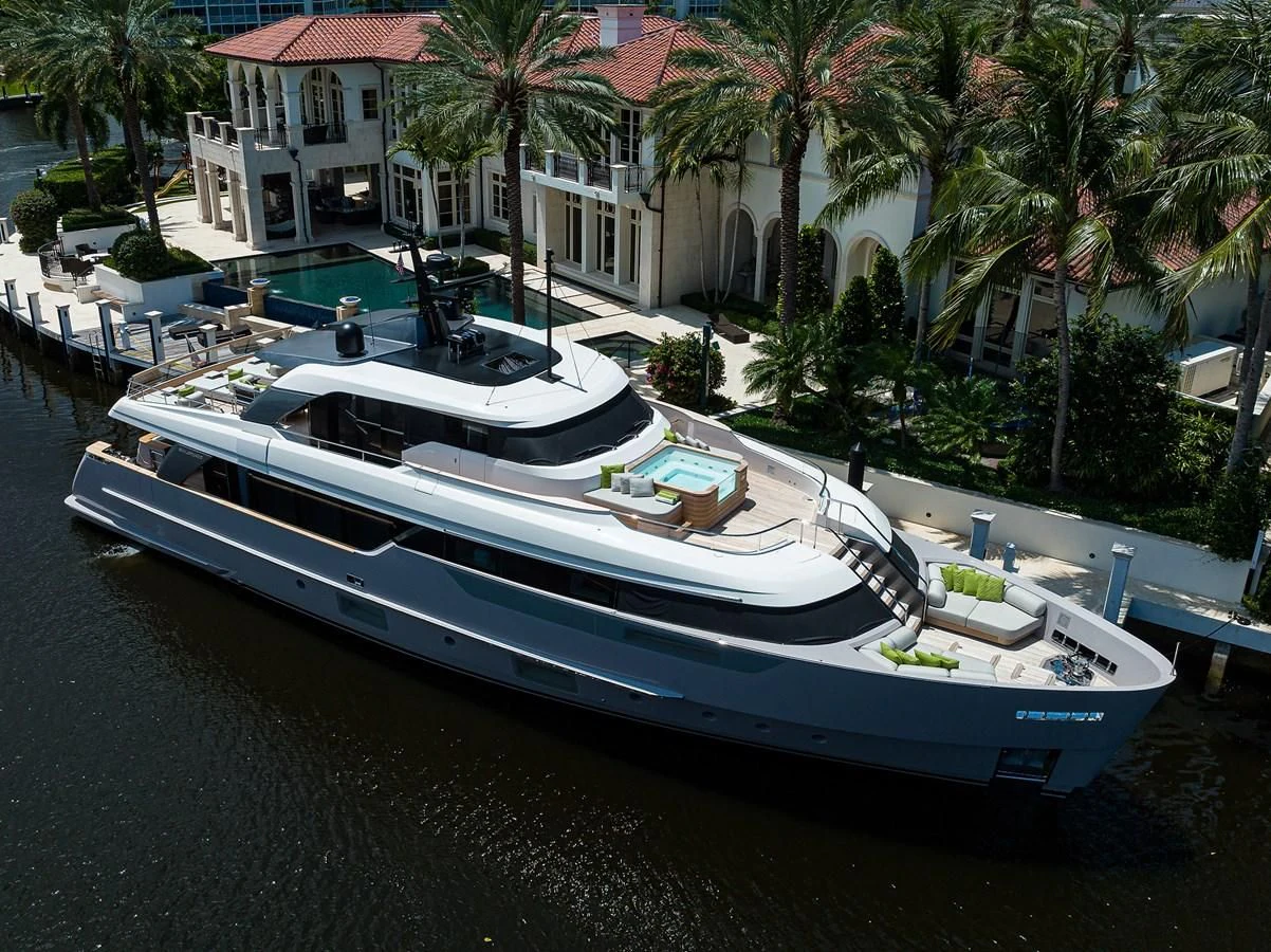 a boat docked at a pier aboard PEARL Yacht for Sale