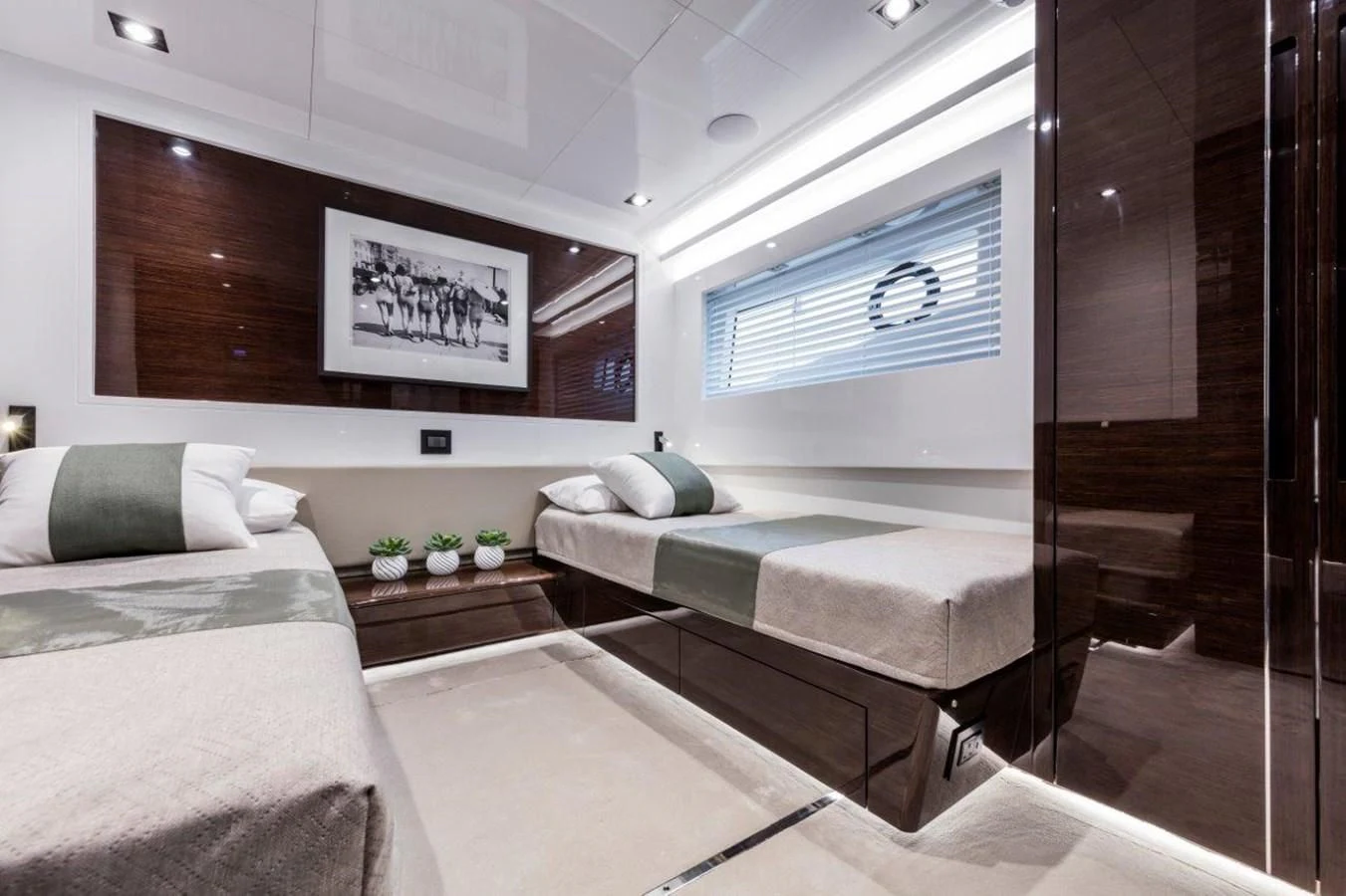 a room with two beds aboard PEARL Yacht for Sale
