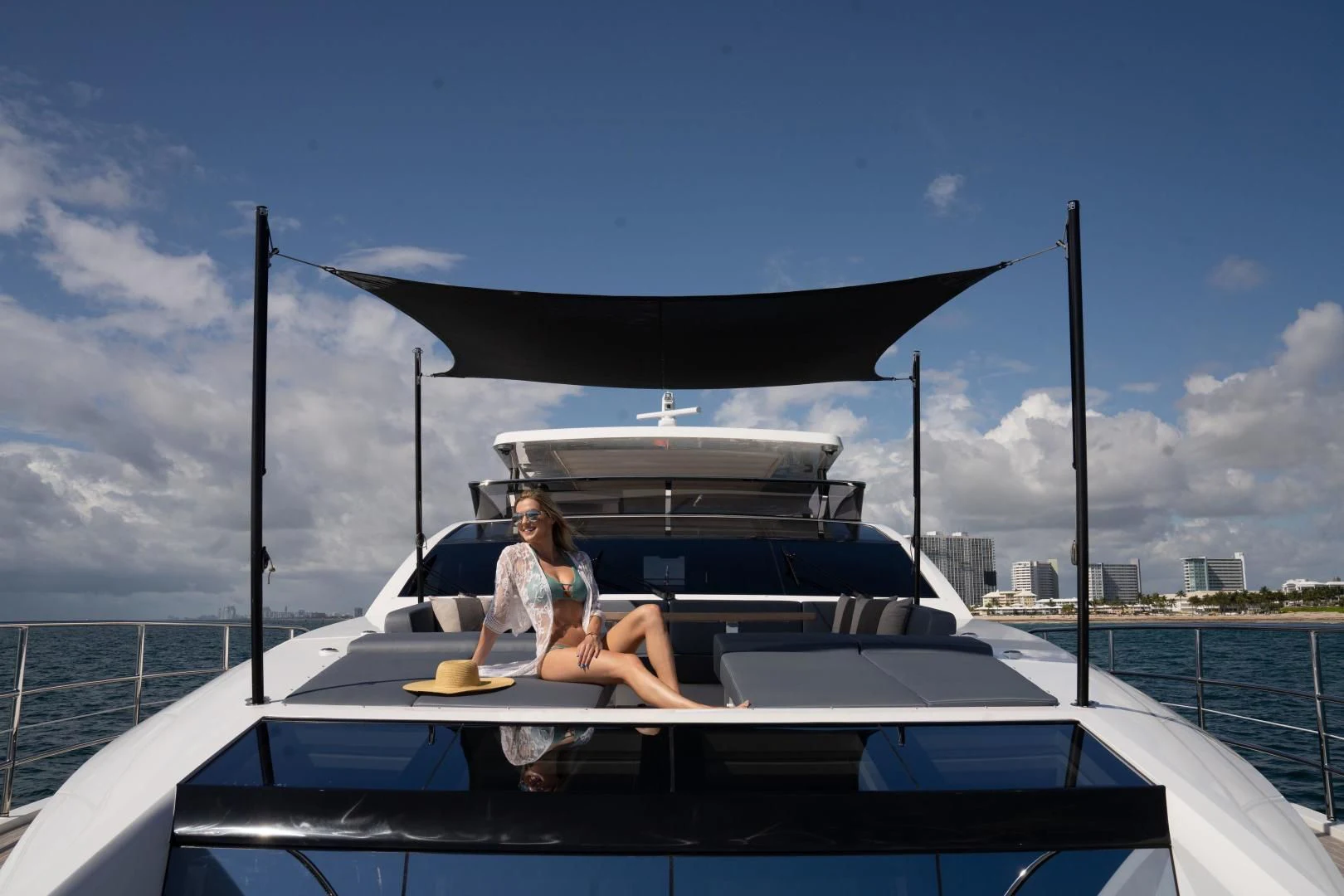 a person sitting on a boat aboard PEARL Yacht for Sale