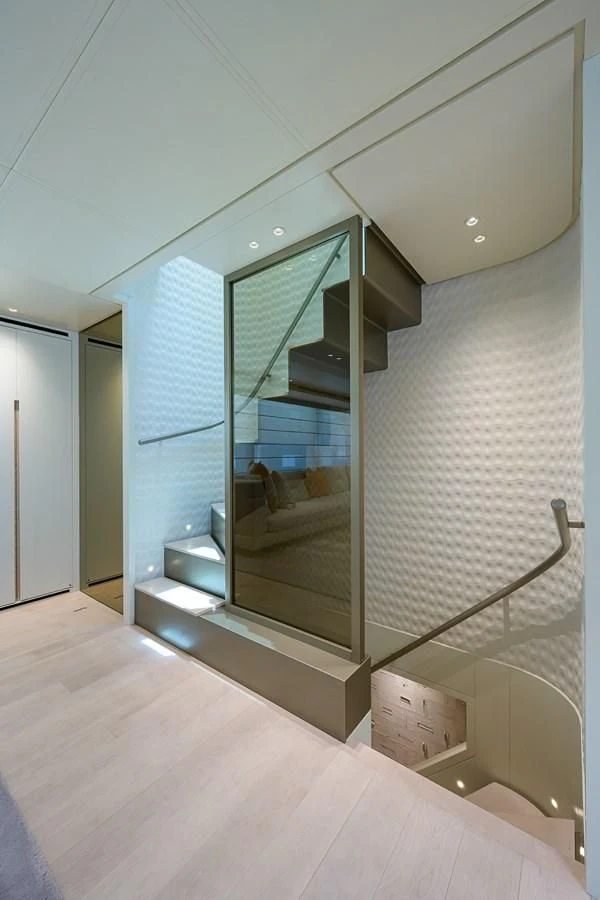 a glass door in a room aboard PEARL Yacht for Sale