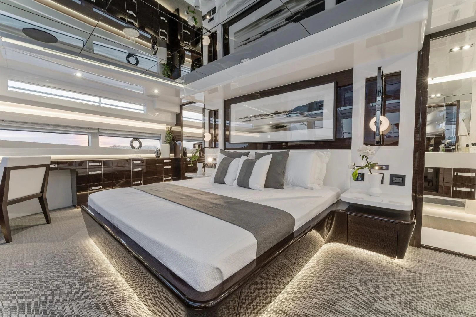 a large bed in a room aboard PEARL Yacht for Sale