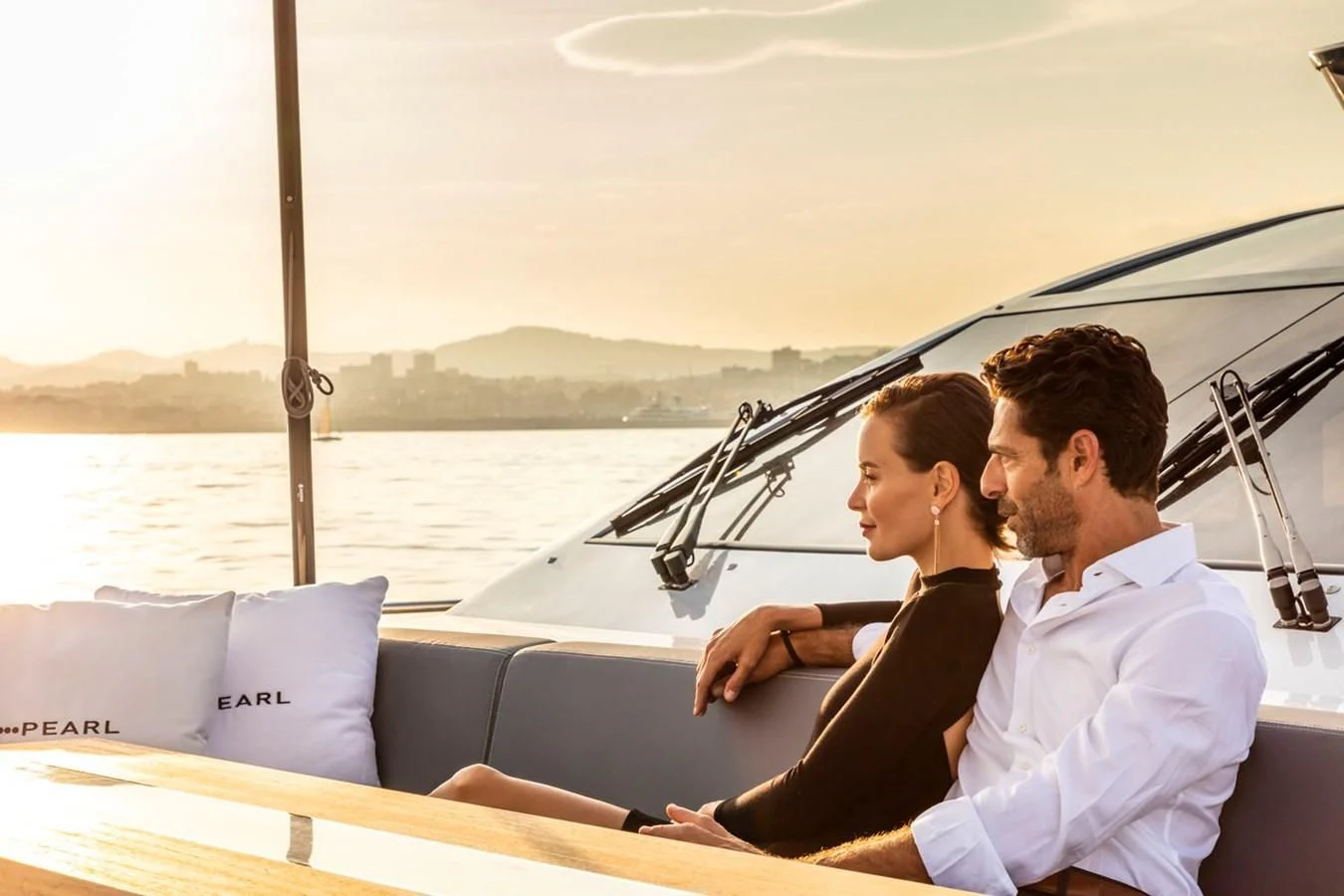 a man and a woman on a boat aboard PEARL Yacht for Sale