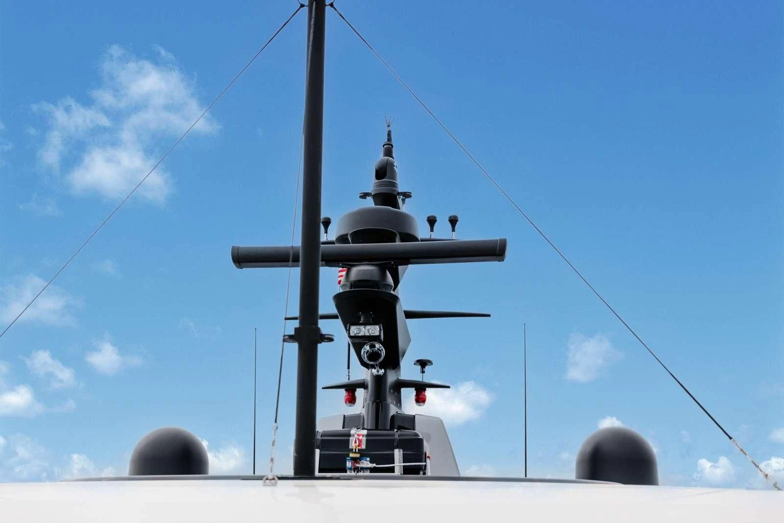 a large tower with a cross on top aboard PEARL Yacht for Sale