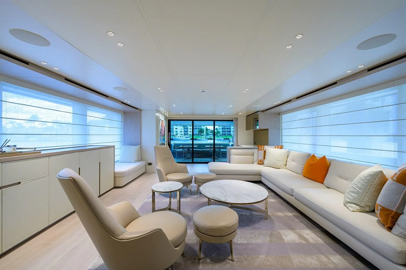 a living room with a large window aboard PEARL Yacht for Sale