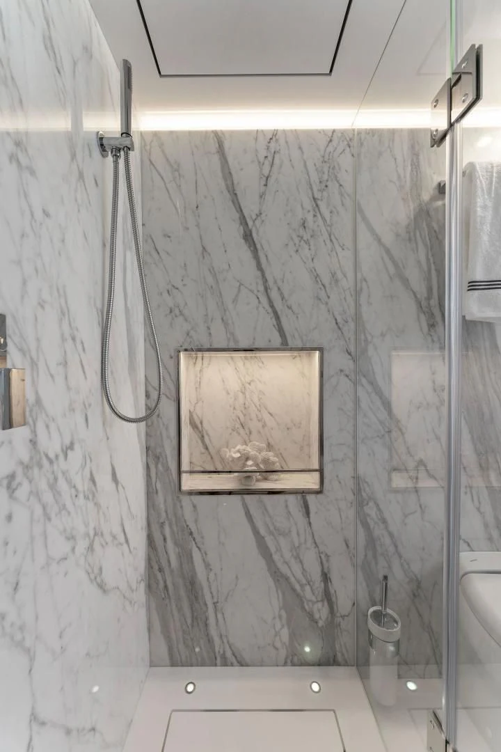 a bathroom with a mirror aboard PEARL Yacht for Sale