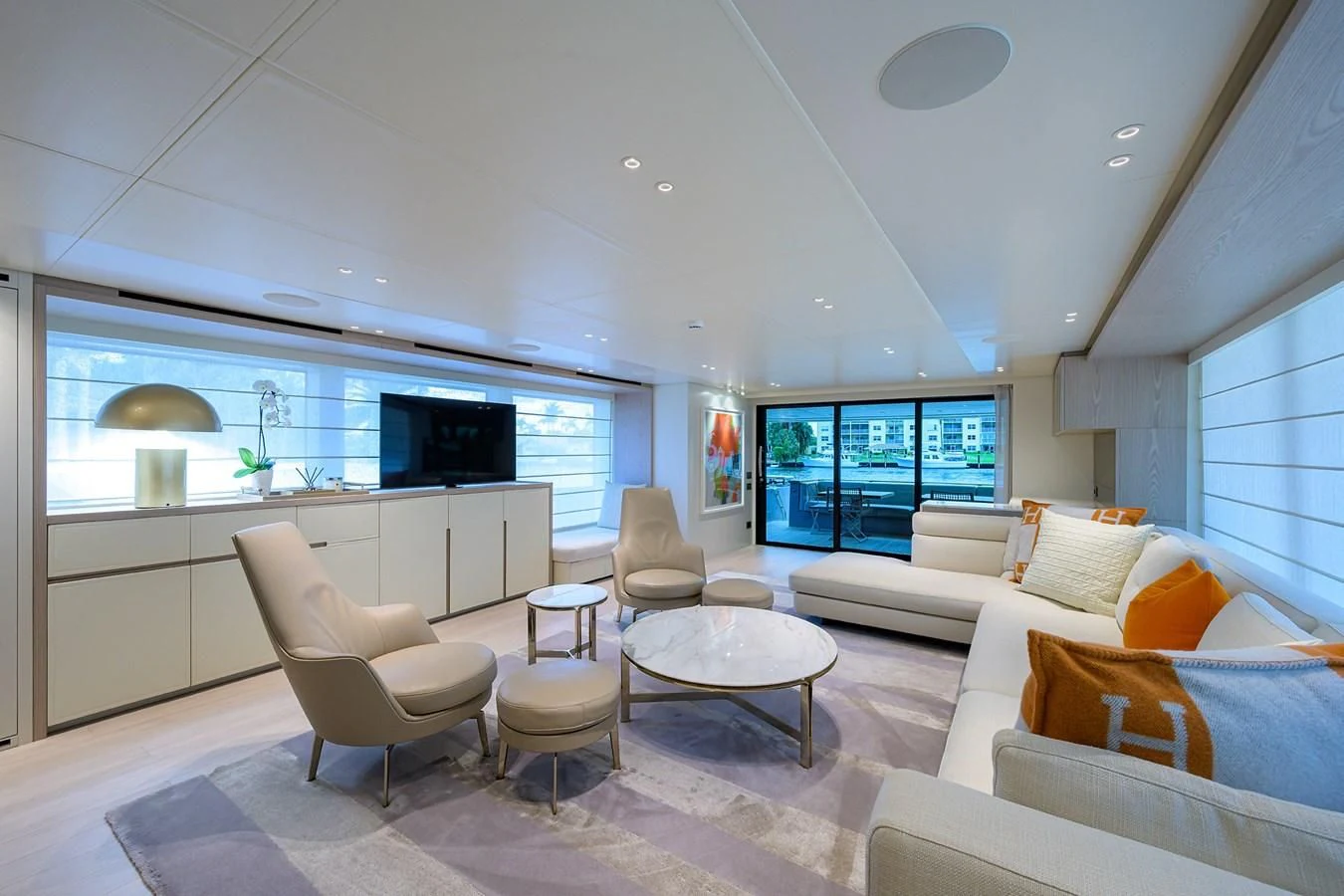 a living room with a large window aboard PEARL Yacht for Sale