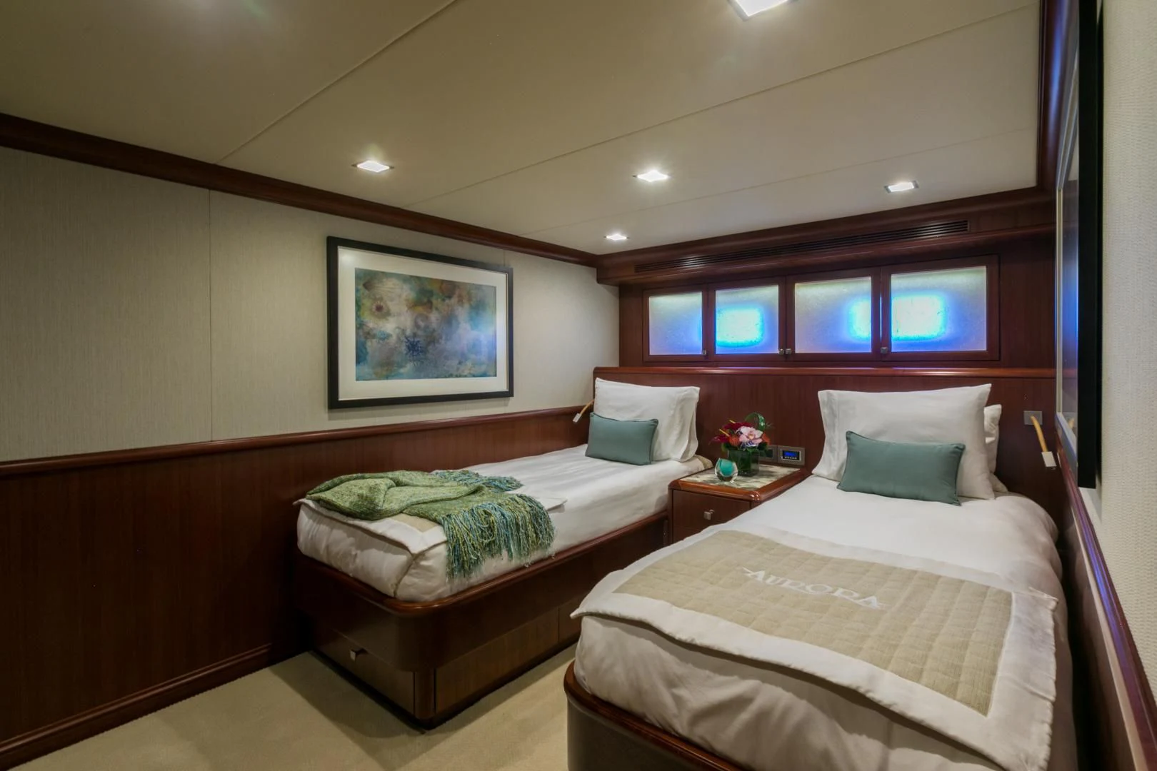 a couple of beds in a hotel room aboard MY AURORA Yacht for Sale