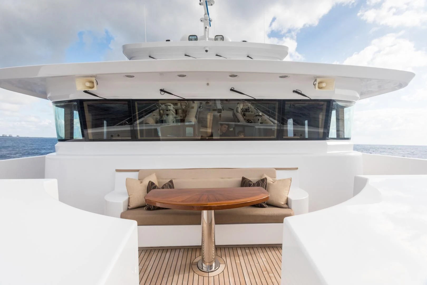 a room with a table and a couch aboard MY AURORA Yacht for Sale