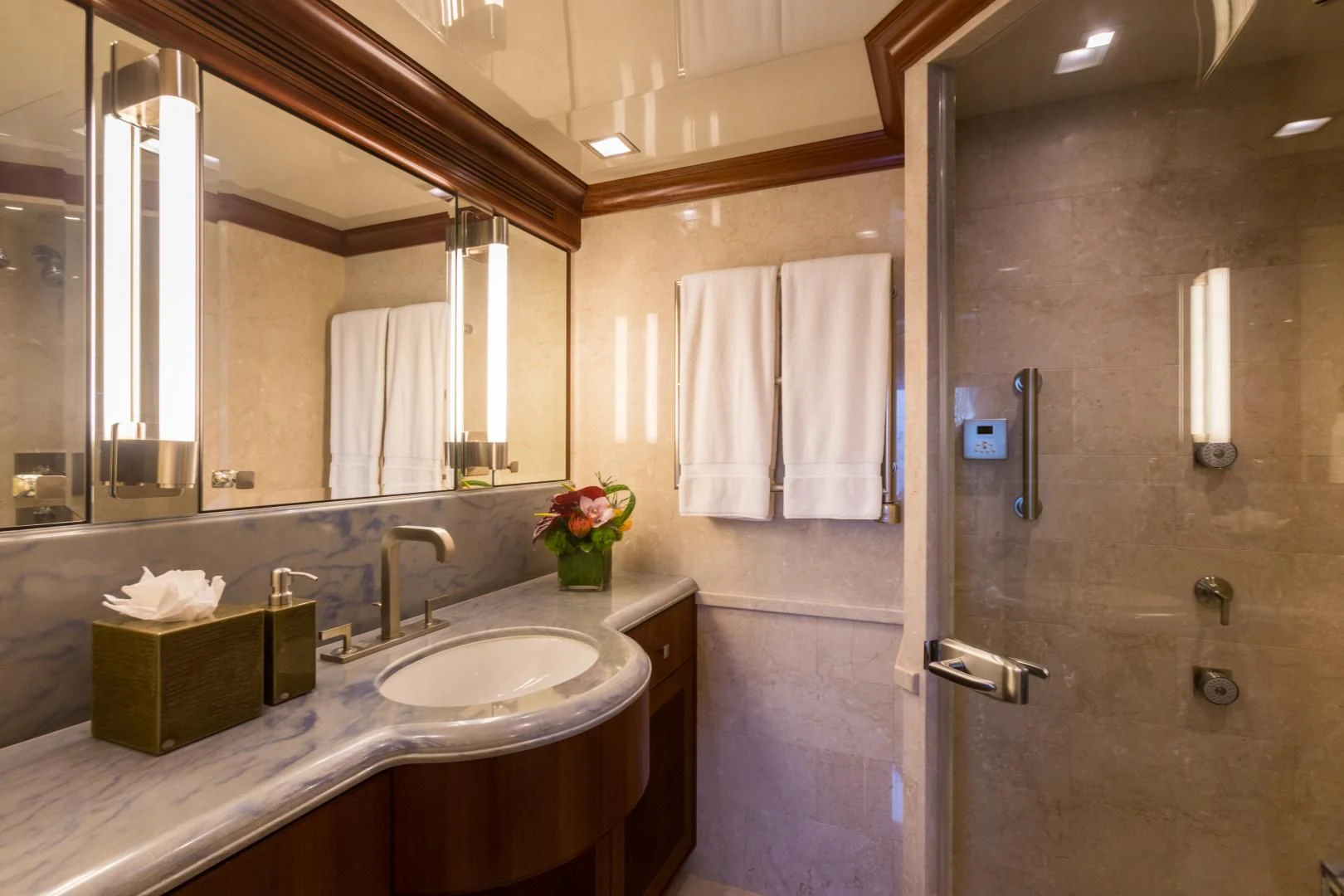 a bathroom with a sink and a mirror aboard MY AURORA Yacht for Sale