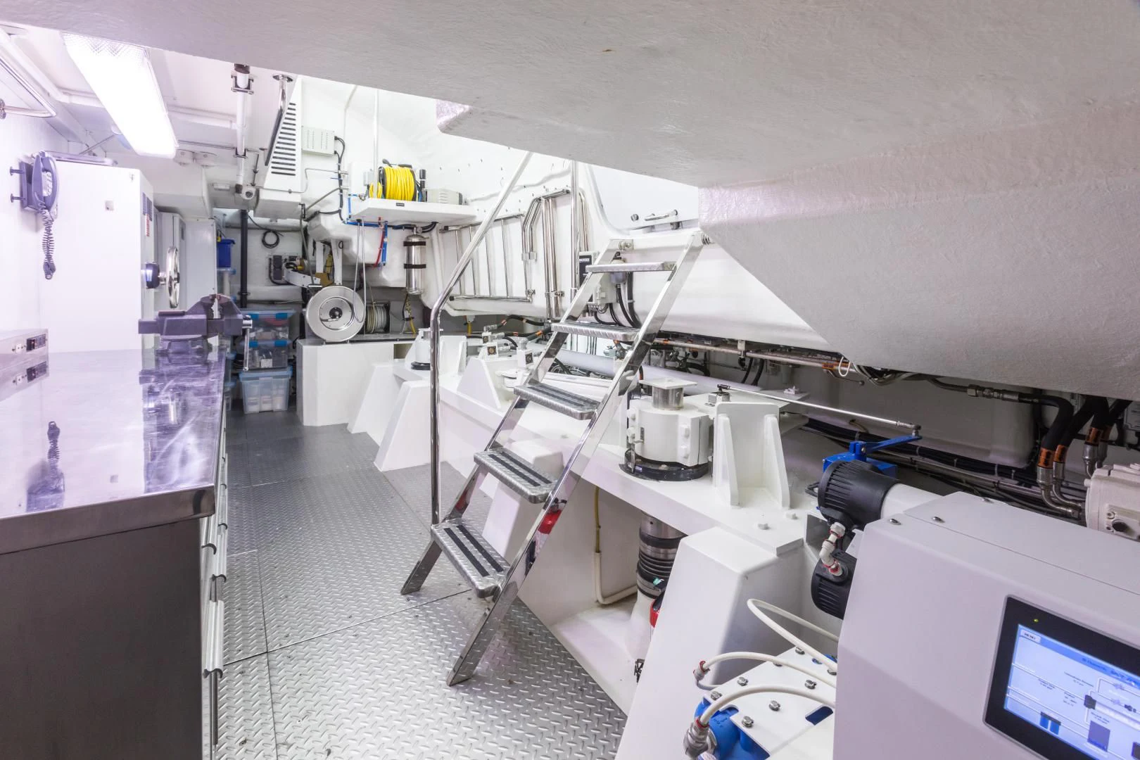 a room with a ladder and a machine aboard MY AURORA Yacht for Sale