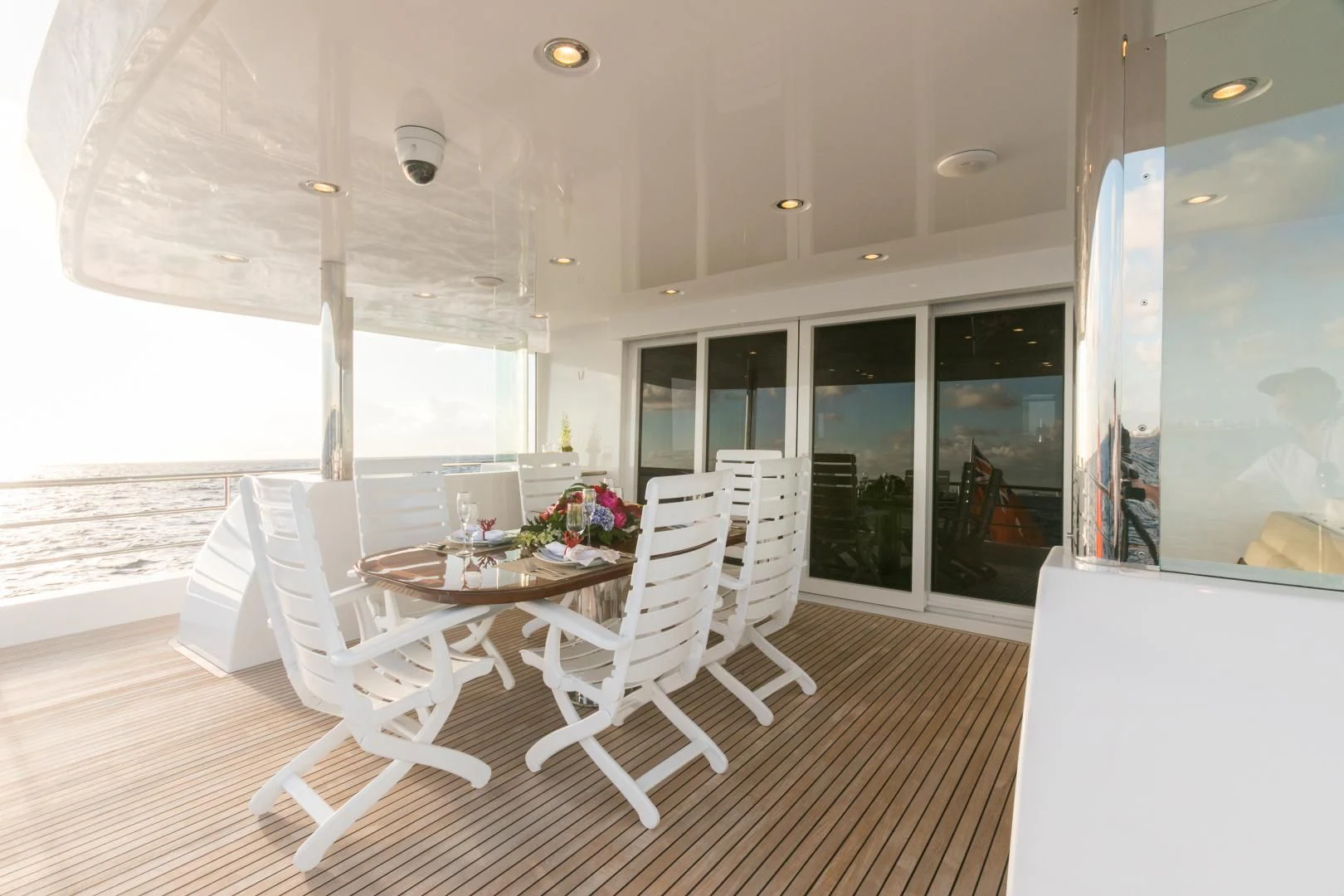 a room with a table and chairs aboard MY AURORA Yacht for Sale