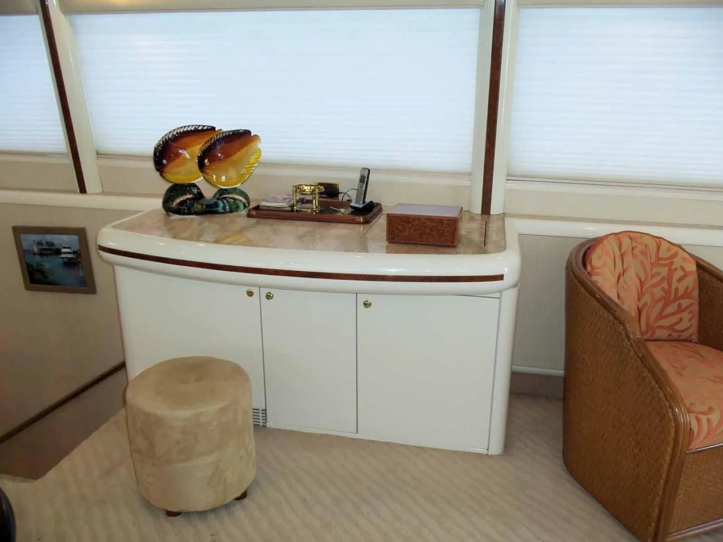 a kitchen with a chair and a table aboard OHANA Yacht for Sale
