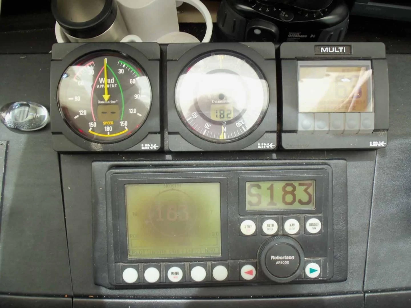 a couple of gauges on a table aboard OHANA Yacht for Sale
