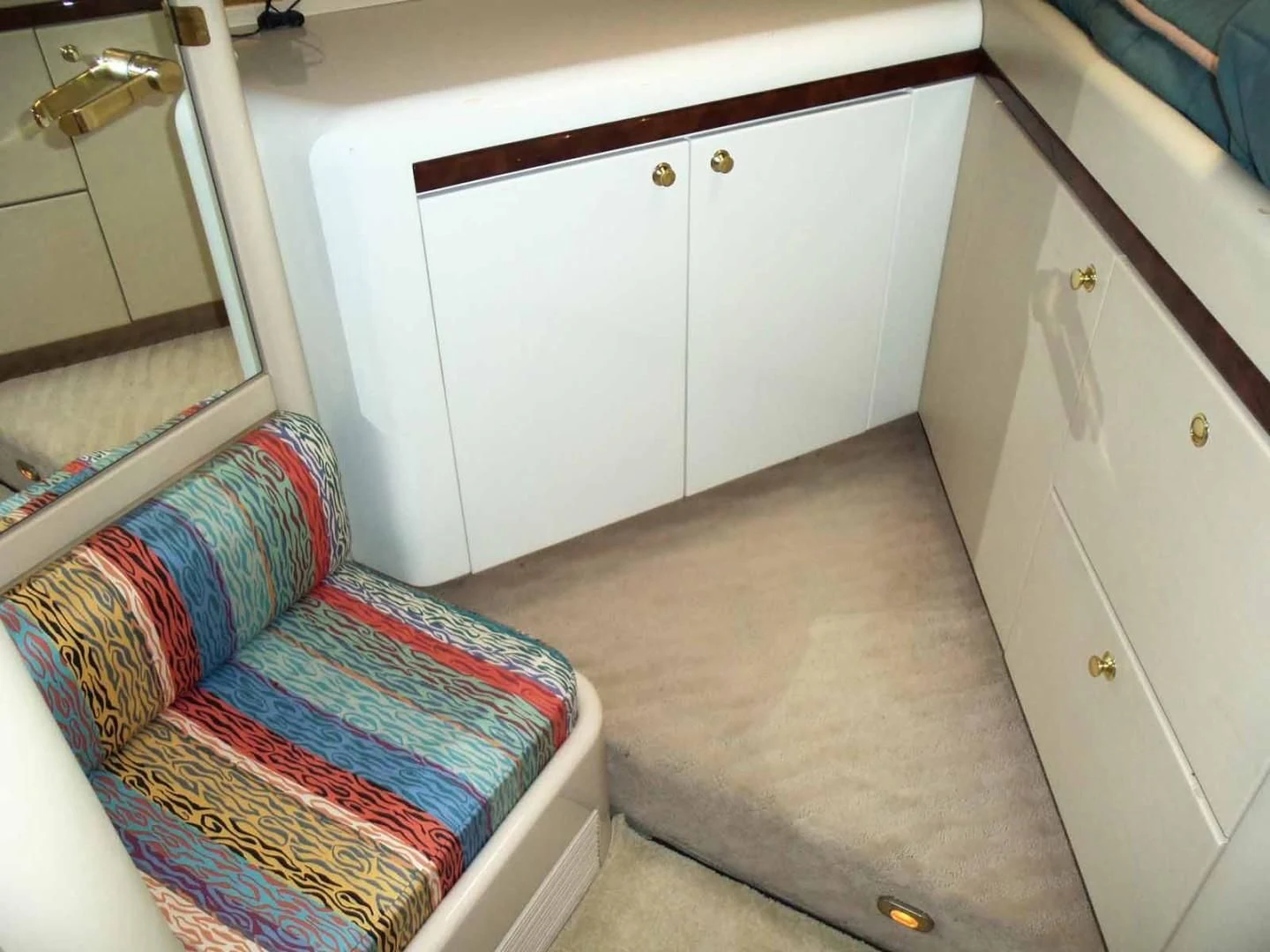 a bed in a room aboard OHANA Yacht for Sale