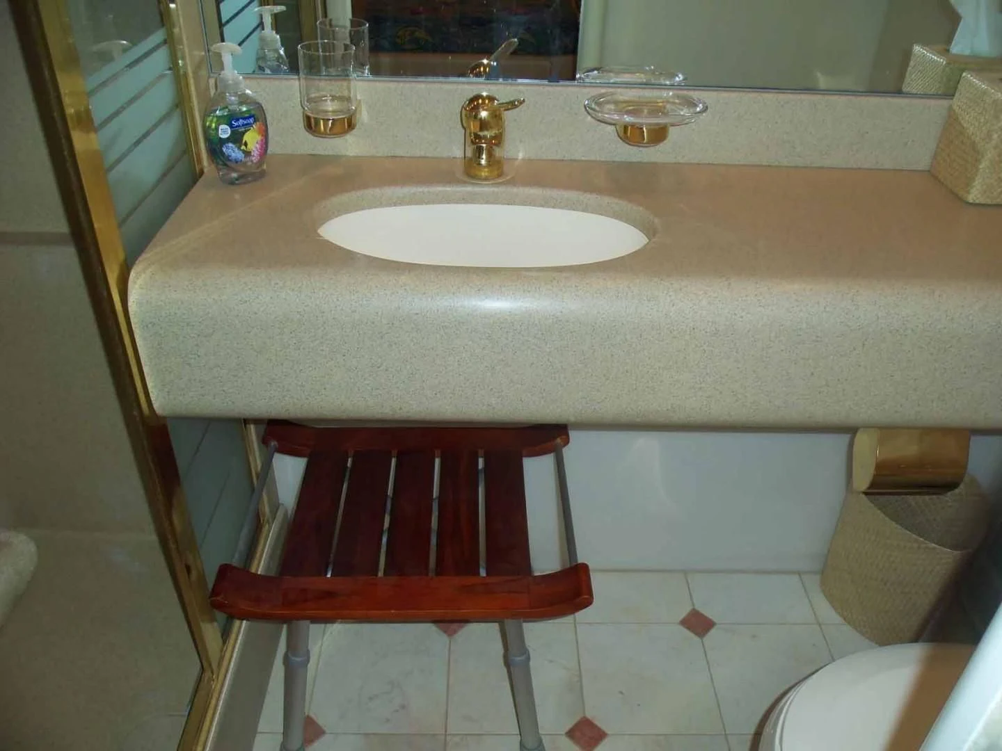 a sink with a red stool aboard OHANA Yacht for Sale