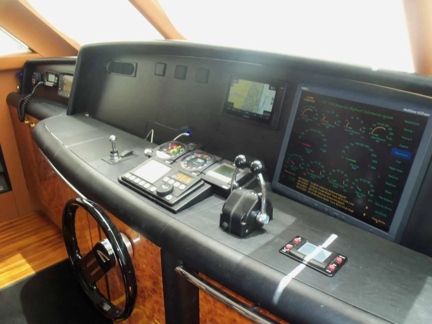 a computer with a large screen aboard OHANA Yacht for Sale