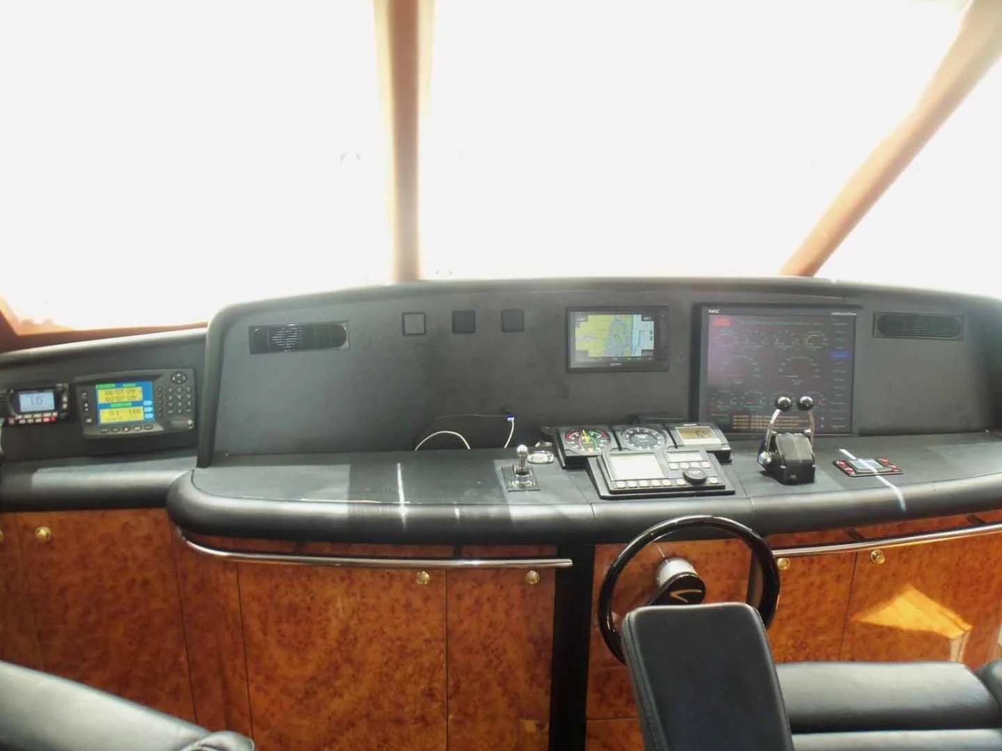 a console with a control panel aboard OHANA Yacht for Sale