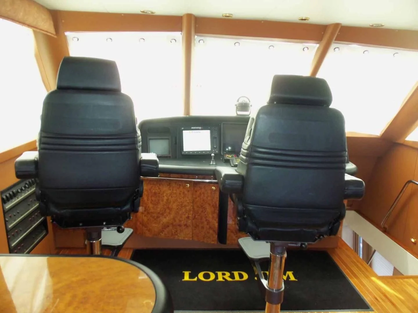 a group of chairs in a room aboard OHANA Yacht for Sale
