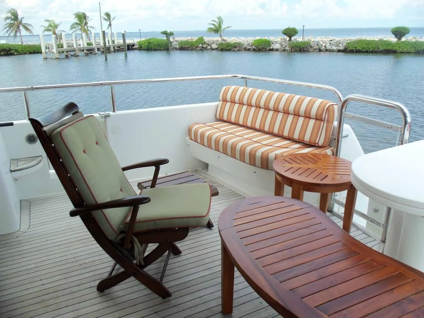 a group of chairs on a boat aboard OHANA Yacht for Sale