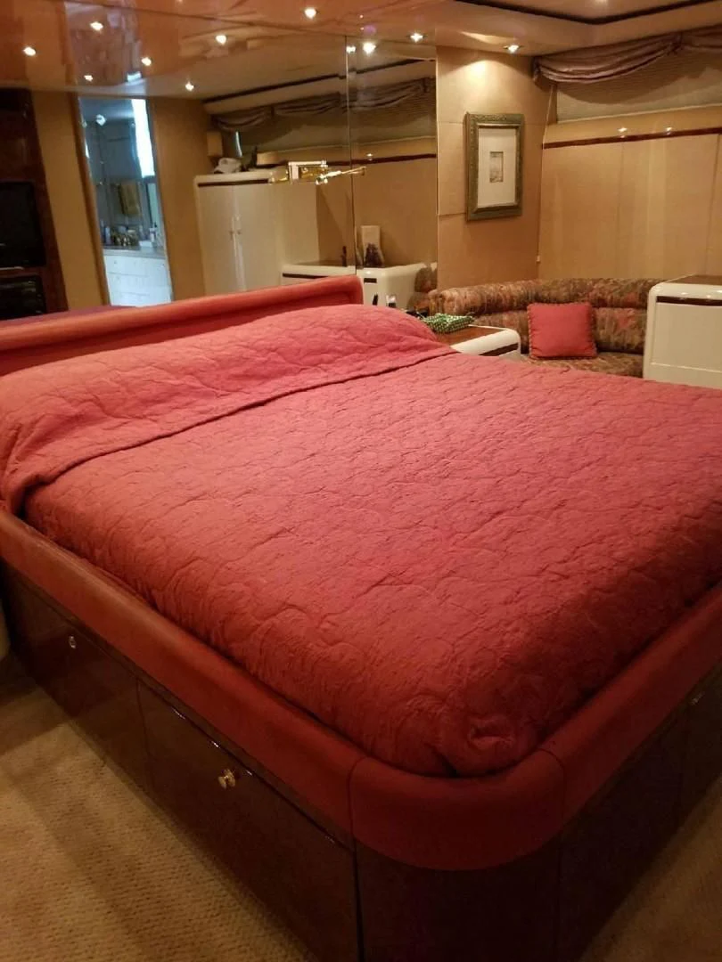 a bed in a room aboard OHANA Yacht for Sale