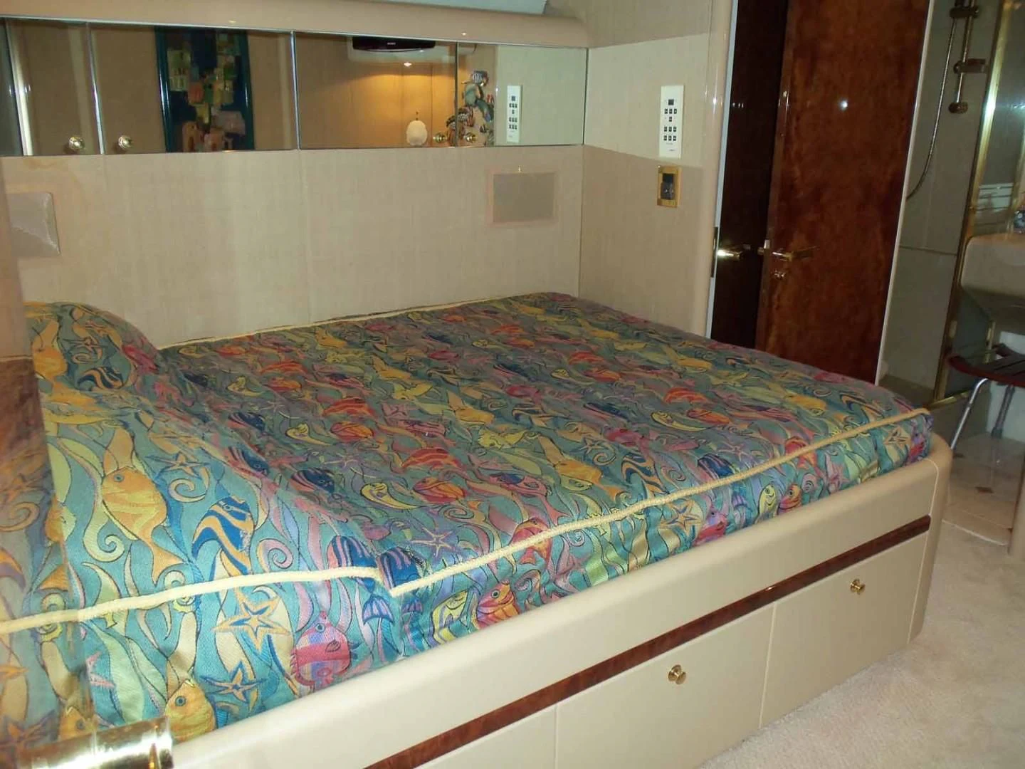 a bed in a room aboard OHANA Yacht for Sale