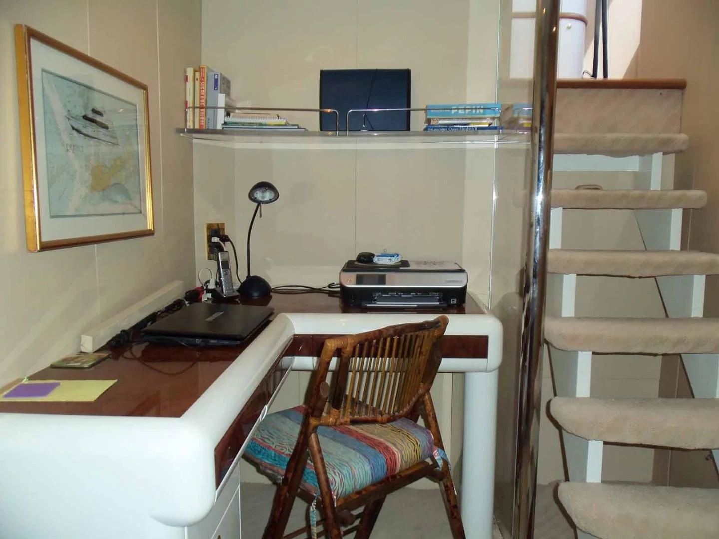 a room with a desk and a chair aboard OHANA Yacht for Sale