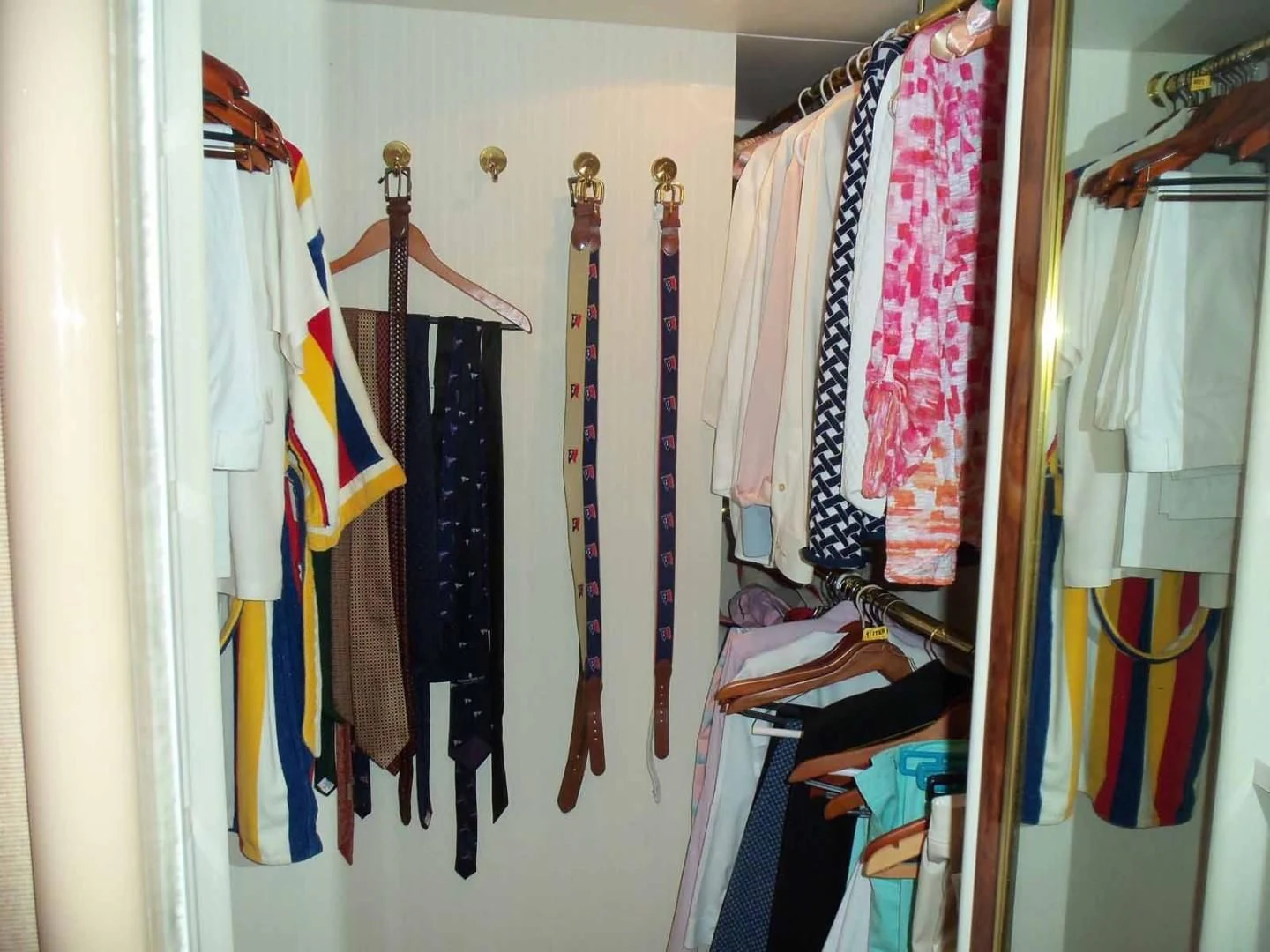 a closet full of clothes aboard OHANA Yacht for Sale