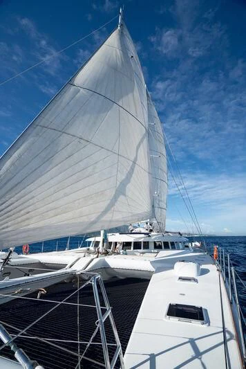 a large white boat with a white sail aboard DOUCE FRANCE Yacht for Sale