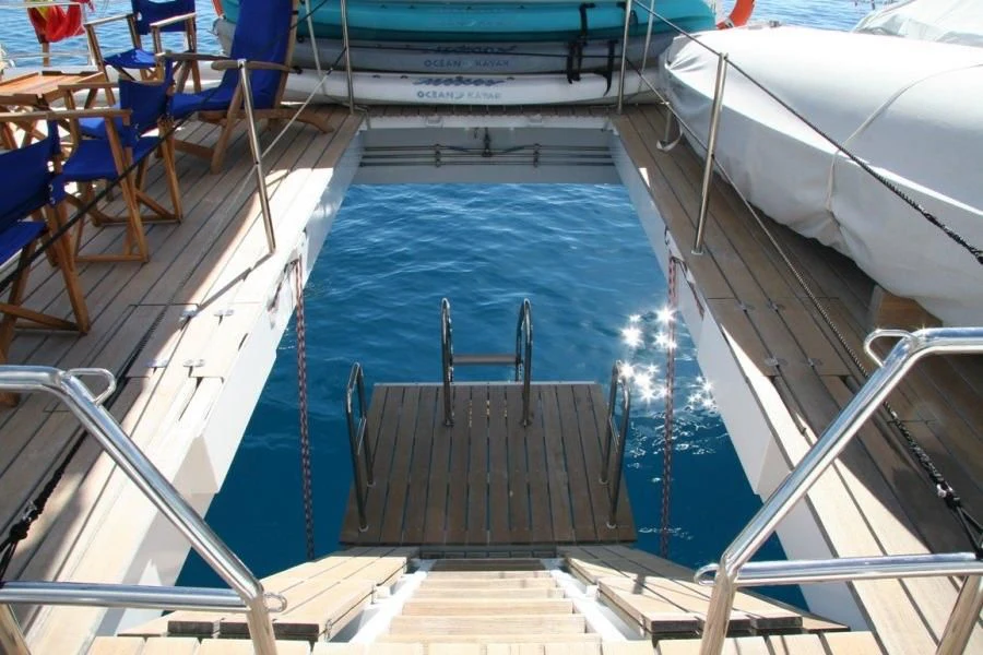 a boat with a ladder aboard DOUCE FRANCE Yacht for Sale
