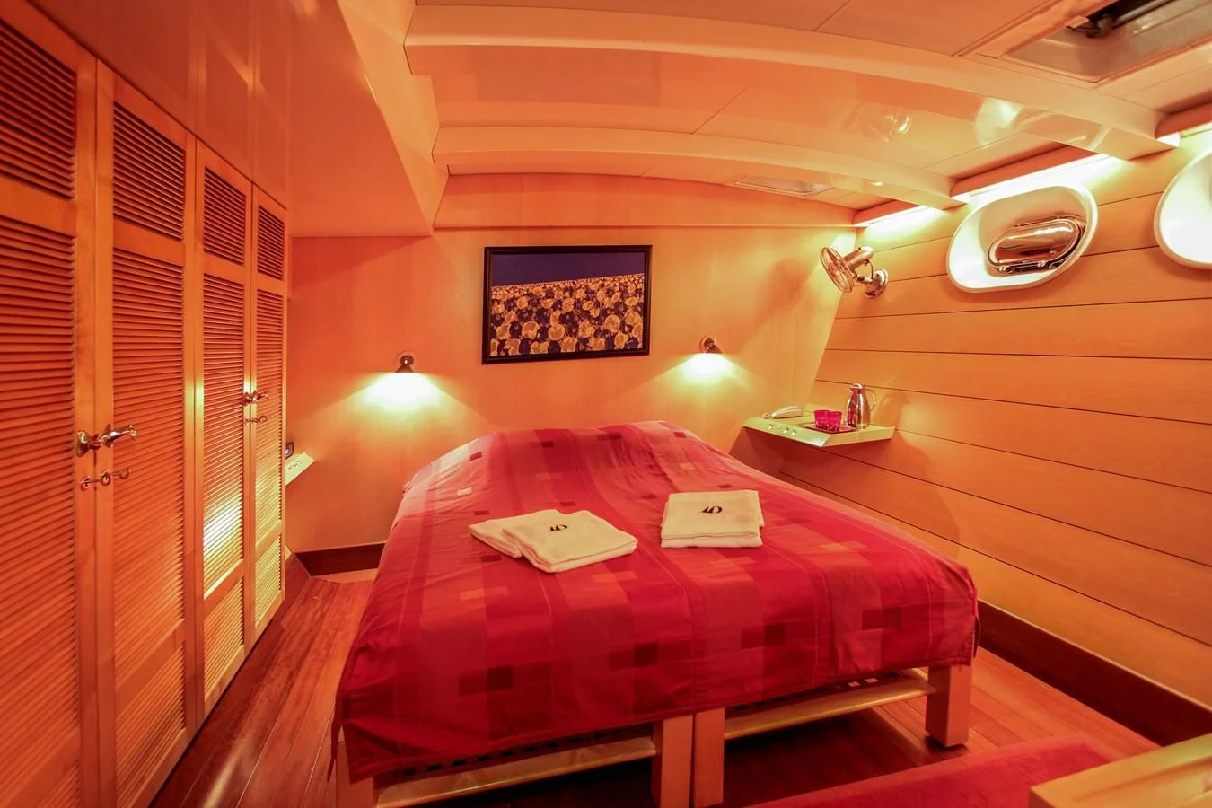 a bed in a room aboard DOUCE FRANCE Yacht for Sale