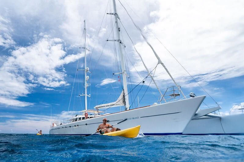 a person on a sailboat aboard DOUCE FRANCE Yacht for Sale