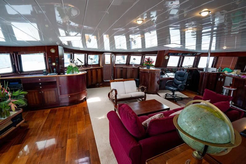 a room with a wood floor and a wood floor aboard DOUCE FRANCE Yacht for Sale