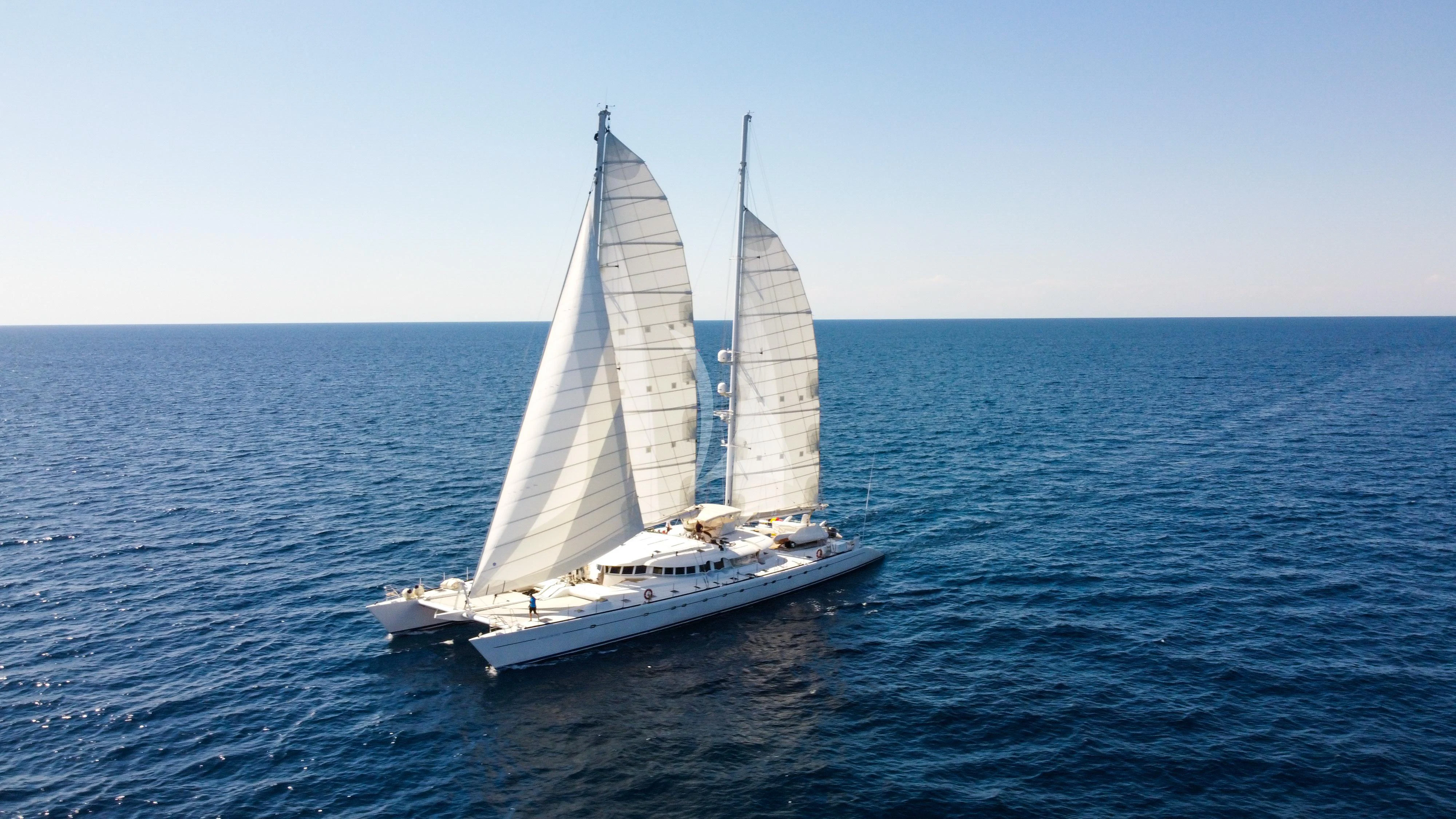 a sailboat on the water aboard DOUCE FRANCE Yacht for Sale