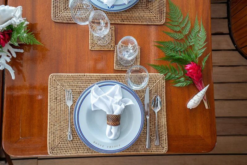 a plate with a slice of chocolate cake on it aboard DOUCE FRANCE Yacht for Sale