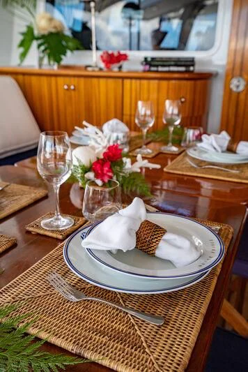 a plate of dessert on a table aboard DOUCE FRANCE Yacht for Sale